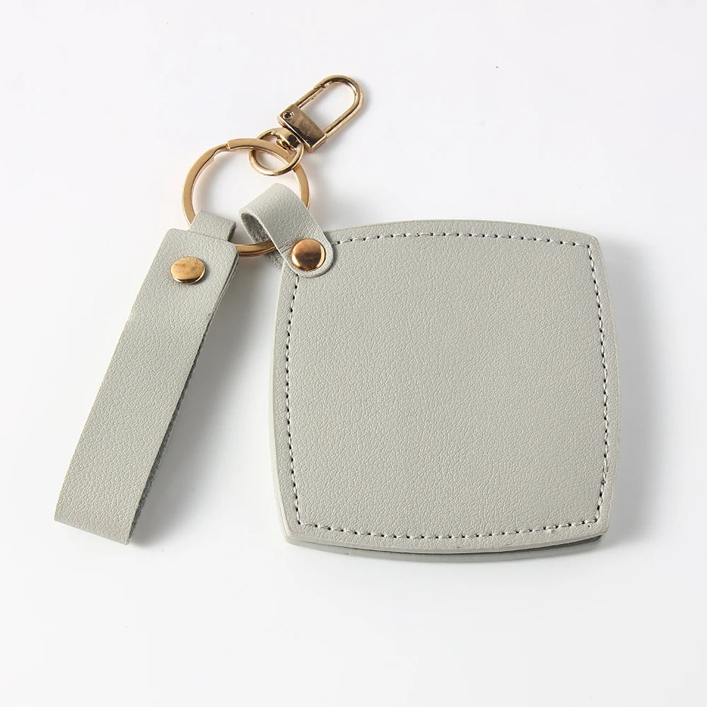 Zonyin New Custom Logo Rotatable Square Makeup Mirror Pu Leather Pocket Mirror Compact Cosmetic Travel Mirror With Keychain