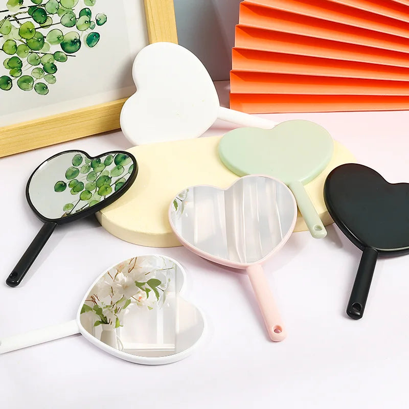 Wholesale Mini Heart Shaped Mirror HD Custom Logo Plastic Hand Held Makeup Mirror Cute Portable Cosmetic Pocket Mirror for Women