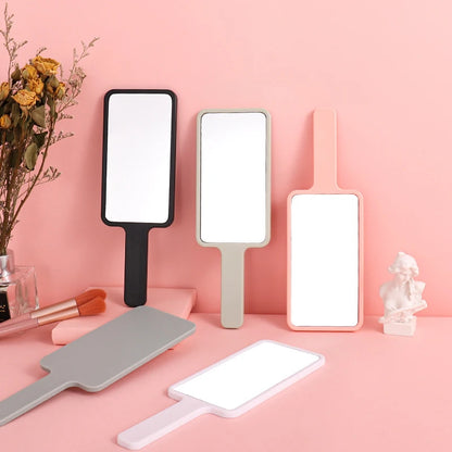 Zonyin Hot Selling Compact Travel Makeup Mirror Rectangle Small Handheld Cosmetic Mirror with Handle Pocket for Beauty