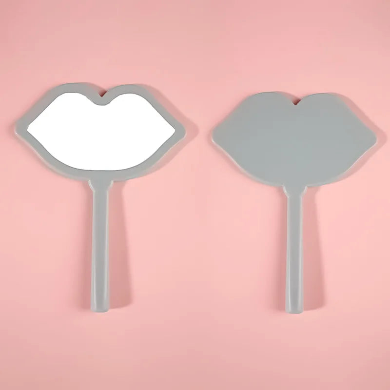 Zonyin Handheld Cosmetic Mirror Cheap Wholesale Small Lip Shaped ABS Plastic Portable Pocket Travel Makeup Mirror Personalized