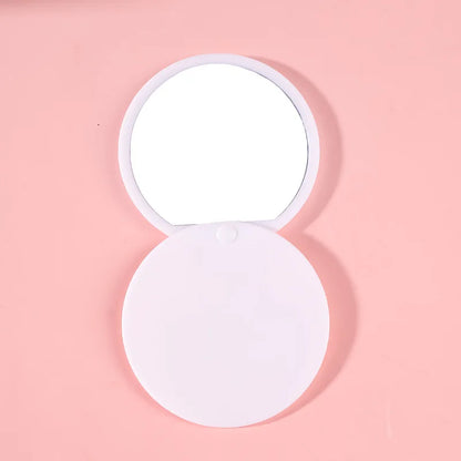 Zonyin Custom logo Plastic Round Sliding Cover Design  Pocket Mirror Wholesale Cheap Portable Pink Small Hand Mirror for Travel