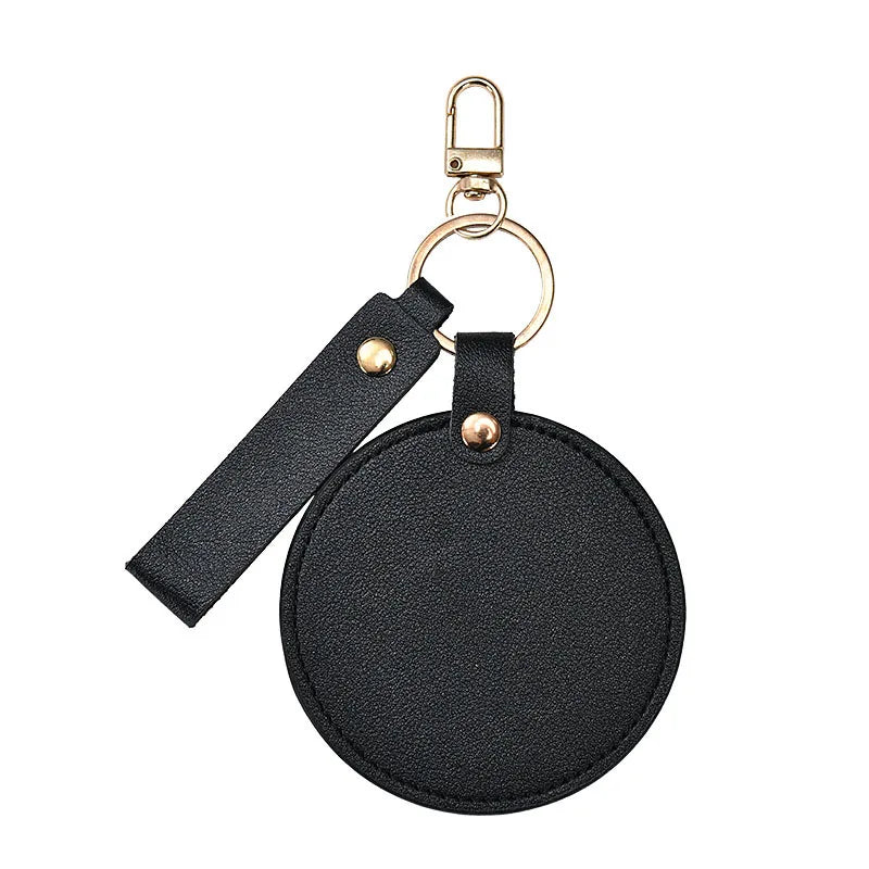 Zonyin LOW MOQ Customized Logo Round Pocket Cosmetic Mirror Pu Leather Portable Small Compact Makeup Mirror with Keychain