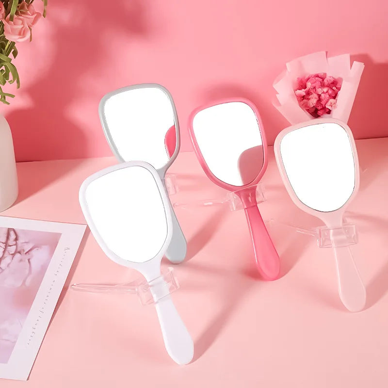 Zonyin Wholesale Cute Portable Hand Held Cosmetic Mirror Custom Logo Product Plastic Handheld Small Makeup Mirror for Beauty