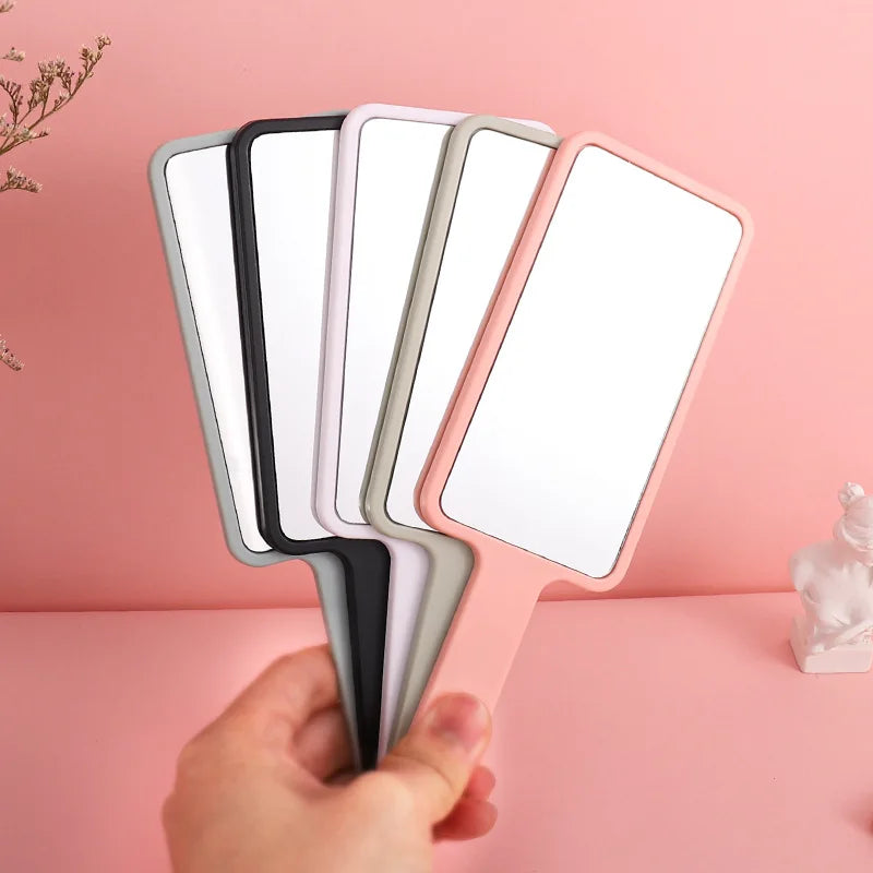 Zonyin Hot Selling Compact Travel Makeup Mirror Rectangle Small Handheld Cosmetic Mirror with Handle Pocket for Beauty