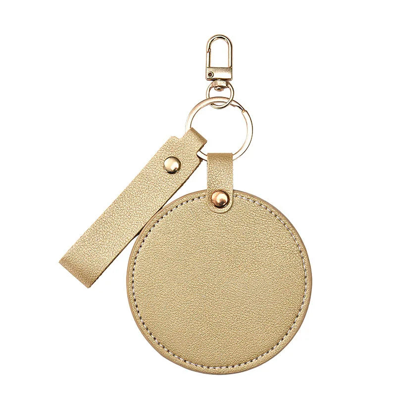 Zonyin LOW MOQ Customized Logo Round Pocket Cosmetic Mirror Pu Leather Portable Small Compact Makeup Mirror with Keychain