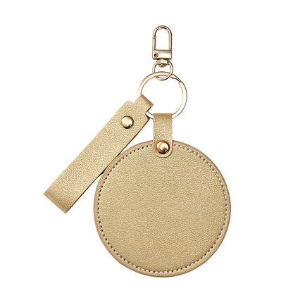 Zonyin LOW MOQ Customized Logo Round Pocket Cosmetic Mirror Pu Leather Portable Small Compact Makeup Mirror with Keychain