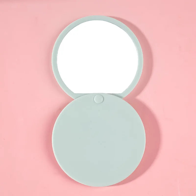 Zonyin Custom logo Plastic Round Sliding Cover Design  Pocket Mirror Wholesale Cheap Portable Pink Small Hand Mirror for Travel