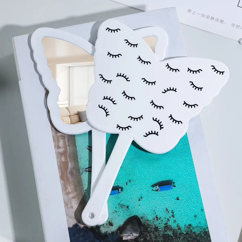 Zonyin New Product Cosmetic Lash Mirror Black Butterfly-shaped Portable Lash Printed Handheld Makeup Mirror for Beauty Salon