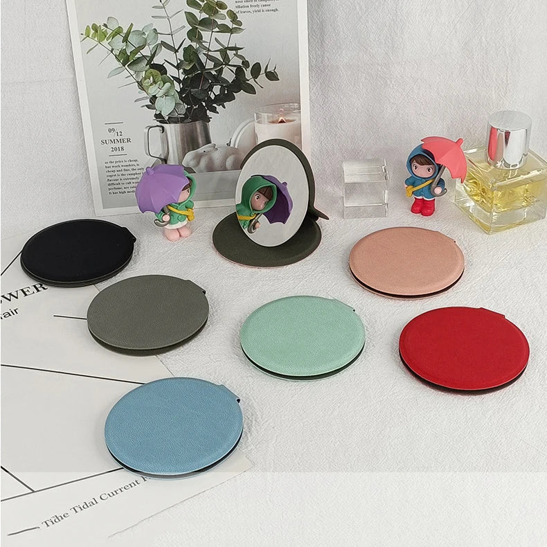 Zonyin Round Pink Pu Leather Case Small Pocket Mirror Embossed Logo Folding Unbreakable HD Metal Standing Mirror for Women