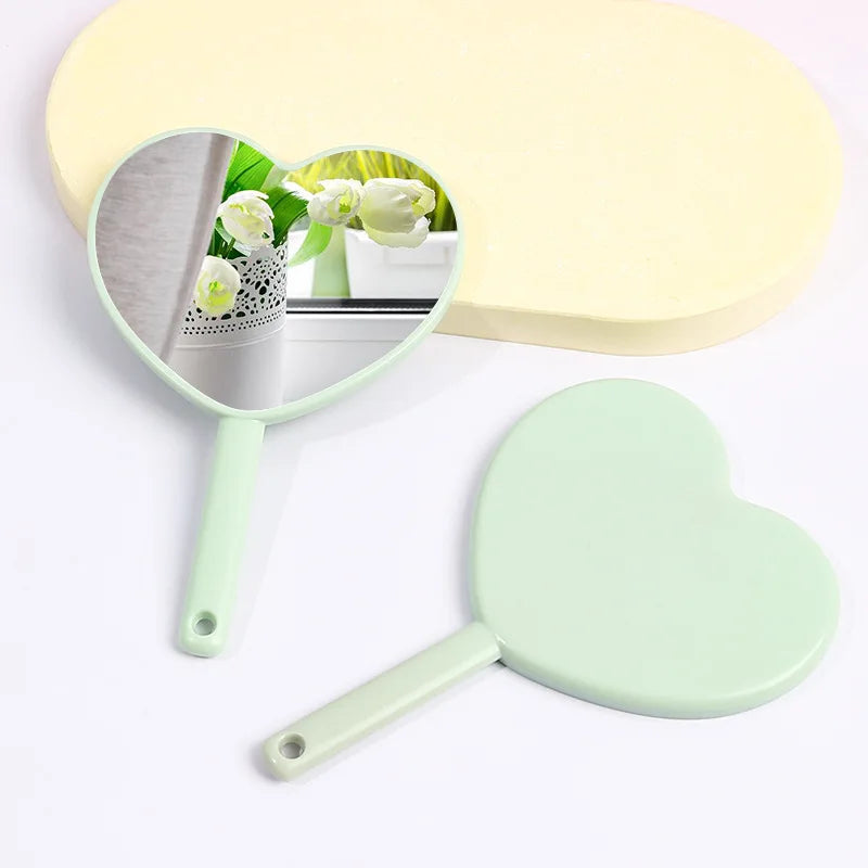 Wholesale Mini Heart Shaped Mirror HD Custom Logo Plastic Hand Held Makeup Mirror Cute Portable Cosmetic Pocket Mirror for Women