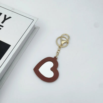 Zonyin High Quality Small Heart Makeup Mirror Key Chain Promotional Heart Shape Key Ring Love Shape Mirror PU Leather Keychain