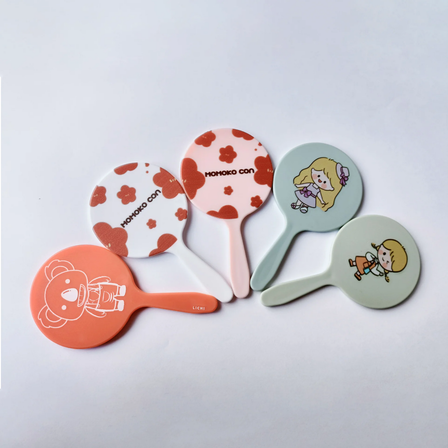 Zonyin Wholesale Custom Logo Plastic Handheld Vanity Mirror Custom Logo Small Round Pocket Makeup Mirror for Portable Travel