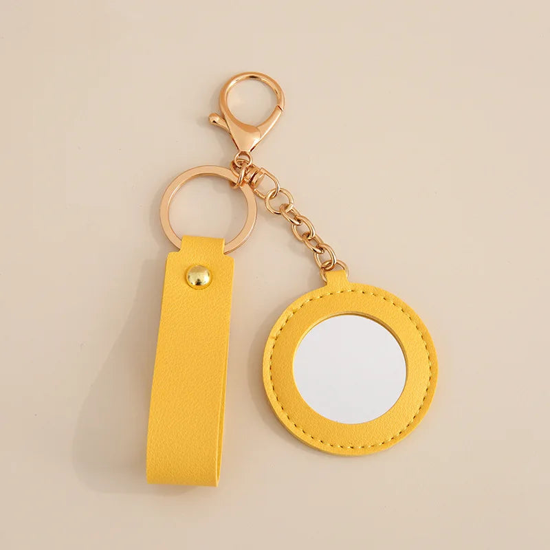 Zonyin Fashion PU Leather Makeup Mirror Bag Key Chain Flower Promotional Gifts Portable Pocket Mirror Heart Mirror With Key Ring