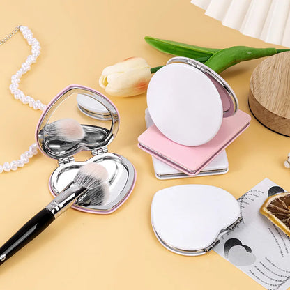 Zonyin Wholesale Private Label Heart Shape Pocket Mirror Double-Side Pu Portable Compact Travel Size Cosmetic Heart Mirror