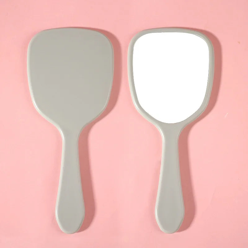 Zonyin Wholesale Cute Portable Hand Held Cosmetic Mirror Custom Logo Product Plastic Handheld Small Makeup Mirror for Beauty