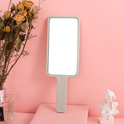 Zonyin Hot Selling Compact Travel Makeup Mirror Rectangle Small Handheld Cosmetic Mirror with Handle Pocket for Beauty