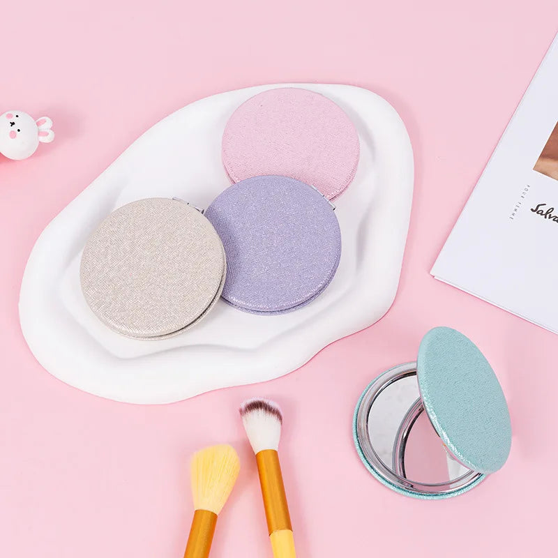 Zonyin Cute Portable Round PU Leather Folding Mirror Shiny Heart Shape 2X Double Sided Pu Pocket Makeup Mirror with Custom Logo