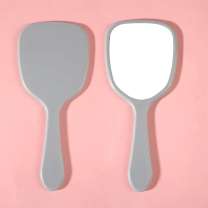 Zonyin Wholesale Cute Portable Hand Held Cosmetic Mirror Custom Logo Product Plastic Handheld Small Makeup Mirror for Beauty