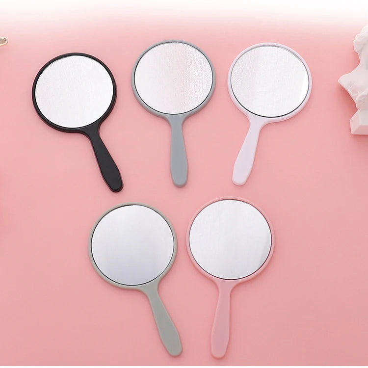 Zonyin Wholesale Custom Logo Plastic Handheld Vanity Mirror Custom Logo Small Round Pocket Makeup Mirror for Portable Travel