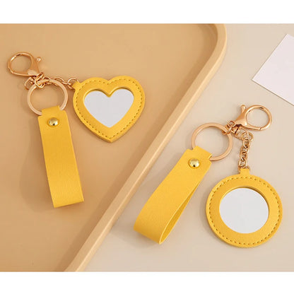 Zonyin Fashion PU Leather Makeup Mirror Bag Key Chain Flower Promotional Gifts Portable Pocket Mirror Heart Mirror With Key Ring