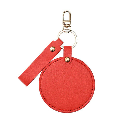 Zonyin LOW MOQ Customized Logo Round Pocket Cosmetic Mirror Pu Leather Portable Small Compact Makeup Mirror with Keychain