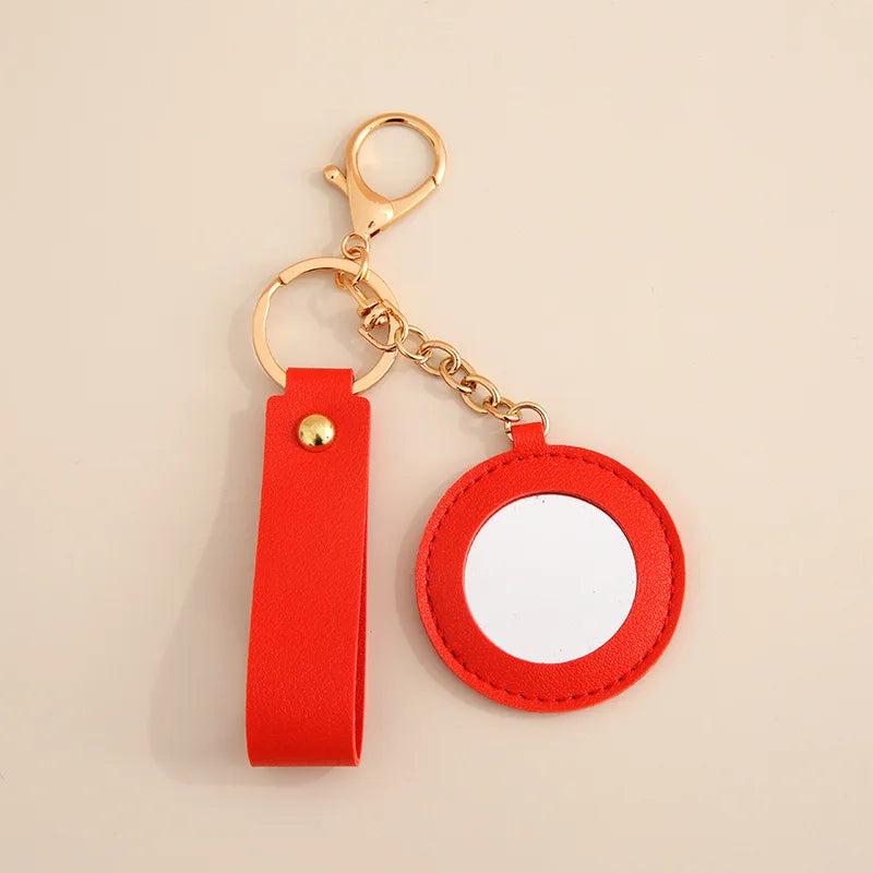 Zonyin Fashion PU Leather Makeup Mirror Bag Key Chain Flower Promotional Gifts Portable Pocket Mirror Heart Mirror With Key Ring