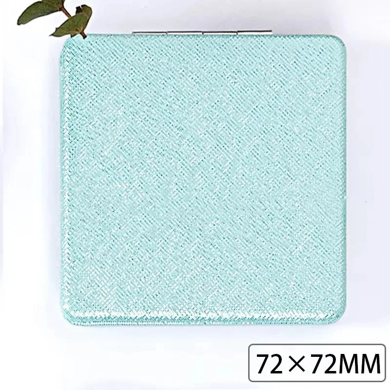 Zonyin Cute Portable Round PU Leather Folding Mirror Shiny Heart Shape 2X Double Sided Pu Pocket Makeup Mirror with Custom Logo