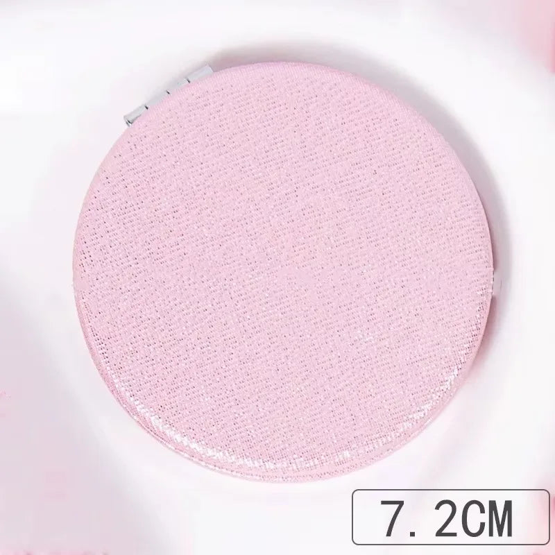 Zonyin Cute Portable Round PU Leather Folding Mirror Shiny Heart Shape 2X Double Sided Pu Pocket Makeup Mirror with Custom Logo