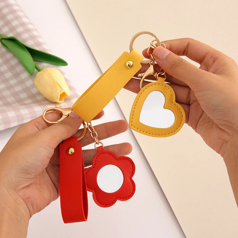 Zonyin Fashion PU Leather Makeup Mirror Bag Key Chain Flower Promotional Gifts Portable Pocket Mirror Heart Mirror With Key Ring
