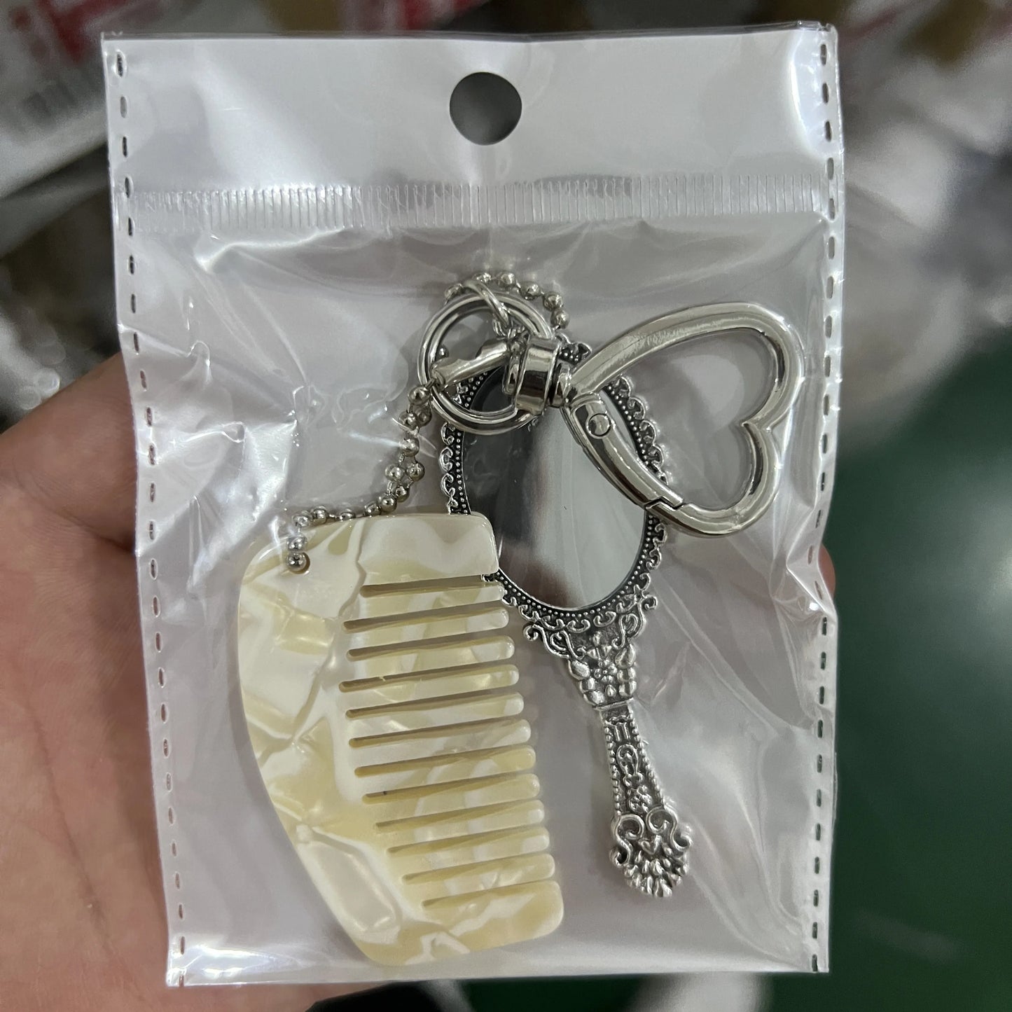 Zonyin Wholesale Mini Handle Handheld Makeup Mirror Keychain with Pendant Comb Mobile Phone Hanging Bag Decorative Accessories