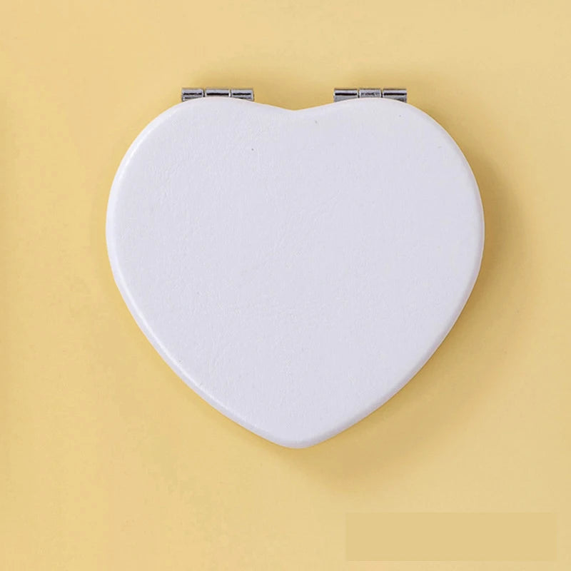 Zonyin Wholesale Private Label Heart Shape Pocket Mirror Double-Side Pu Portable Compact Travel Size Cosmetic Heart Mirror