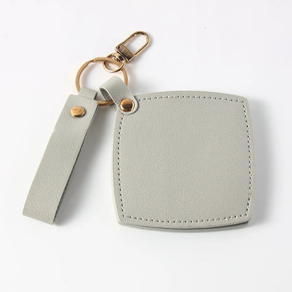 Zonyin New Custom Logo Rotatable Square Makeup Mirror Pu Leather Pocket Mirror Compact Cosmetic Travel Mirror With Keychain