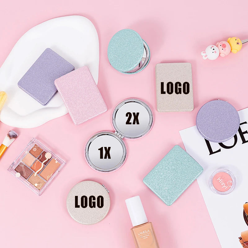 Zonyin Cute Portable Round PU Leather Folding Mirror Shiny Heart Shape 2X Double Sided Pu Pocket Makeup Mirror with Custom Logo