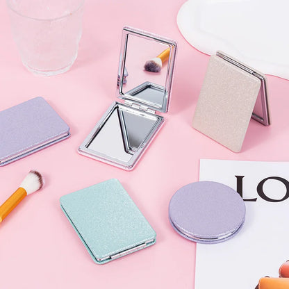 Zonyin Cute Portable Round PU Leather Folding Mirror Shiny Heart Shape 2X Double Sided Pu Pocket Makeup Mirror with Custom Logo