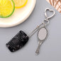 Zonyin Wholesale Mini Handle Handheld Makeup Mirror Keychain with Pendant Comb Mobile Phone Hanging Bag Decorative Accessories