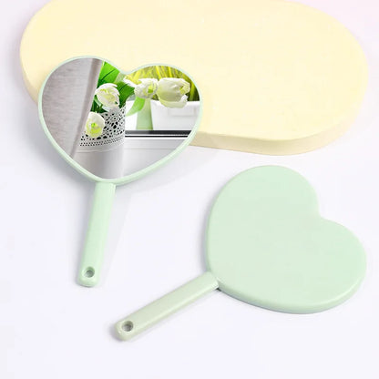 Wholesale Mini Heart Shaped Mirror HD Custom Logo Plastic Hand Held Makeup Mirror Cute Portable Cosmetic Pocket Mirror for Women