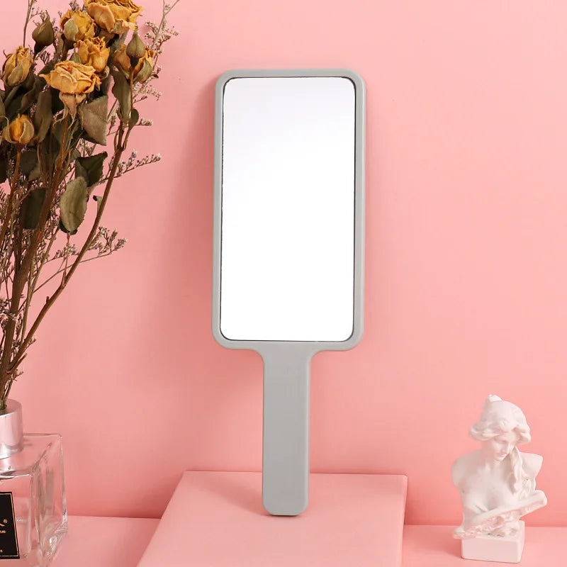 Zonyin Hot Selling Compact Travel Makeup Mirror Rectangle Small Handheld Cosmetic Mirror with Handle Pocket for Beauty