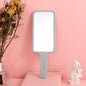 Zonyin Hot Selling Compact Travel Makeup Mirror Rectangle Small Handheld Cosmetic Mirror with Handle Pocket for Beauty