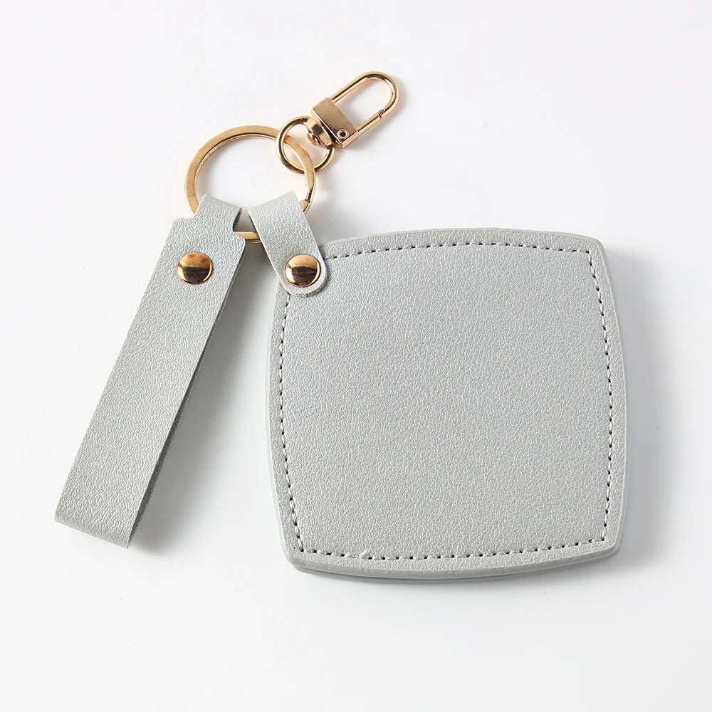 Zonyin New Custom Logo Rotatable Square Makeup Mirror Pu Leather Pocket Mirror Compact Cosmetic Travel Mirror With Keychain