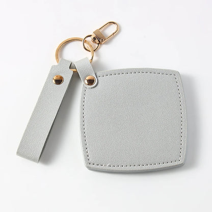 Zonyin New Custom Logo Rotatable Square Makeup Mirror Pu Leather Pocket Mirror Compact Cosmetic Travel Mirror With Keychain