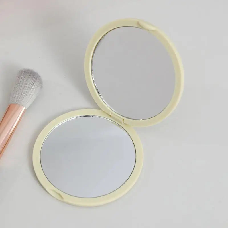Zonyin Custom Logo Portable Pocket Travel Makeup Mirror Hot Selling Double-Sided Folding Cosmetic Mirror for Women