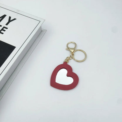 Zonyin PU Leather Makeup Mirror Key Chain Custom Logo Blank Promotional Gifts Portable Pocket Mirror Heart Mirror Keychain Bulk