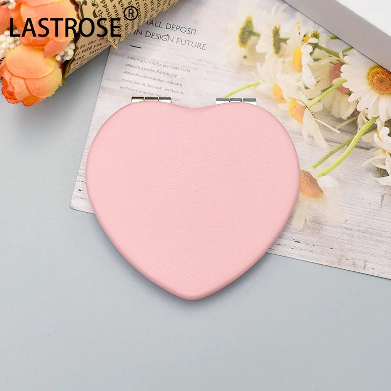 Zonyin Wholesale Private Label Heart Shape Pocket Mirror Double-Side Pu Portable Compact Travel Size Cosmetic Heart Mirror