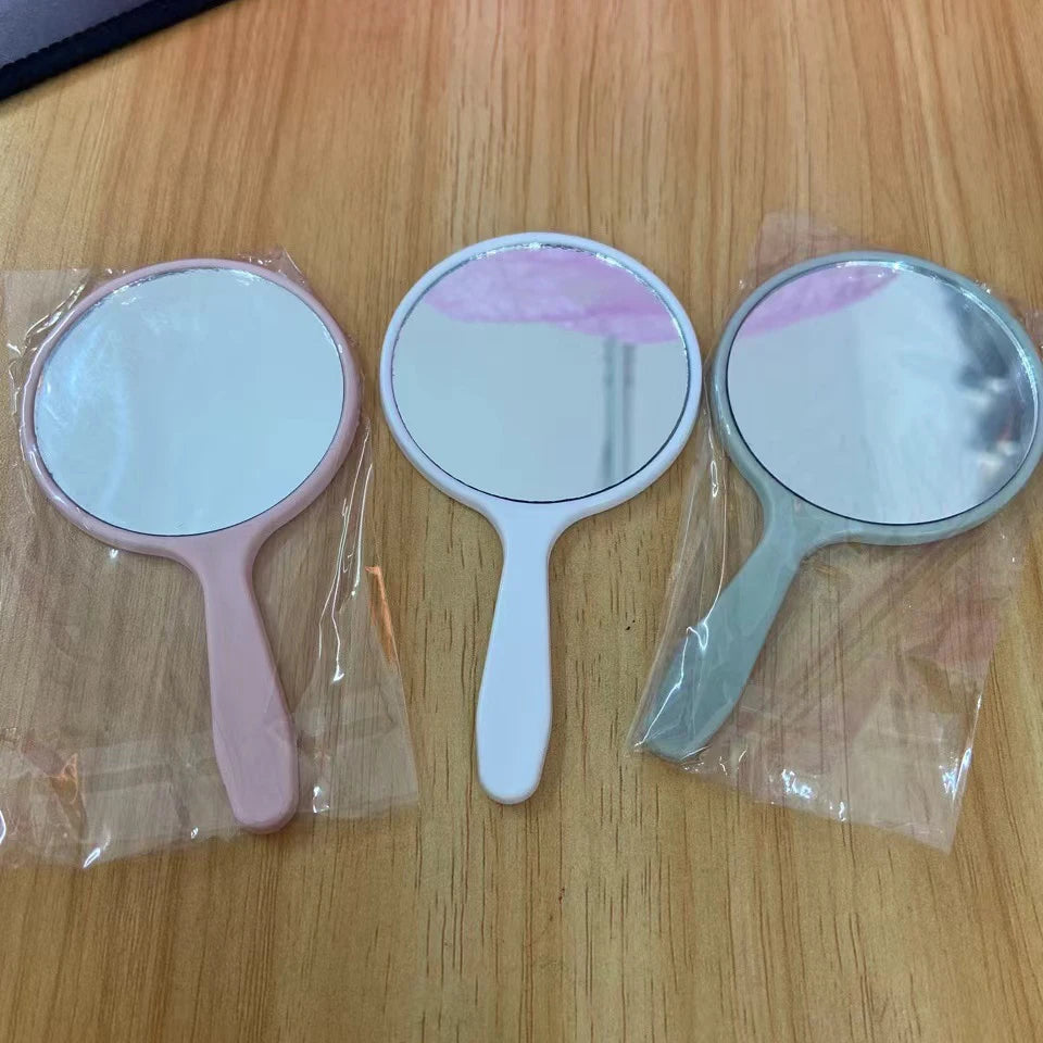 Zonyin Wholesale Custom Logo Plastic Handheld Vanity Mirror Custom Logo Small Round Pocket Makeup Mirror for Portable Travel