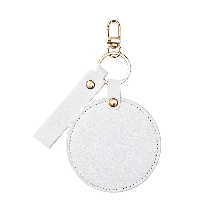 Zonyin LOW MOQ Customized Logo Round Pocket Cosmetic Mirror Pu Leather Portable Small Compact Makeup Mirror with Keychain