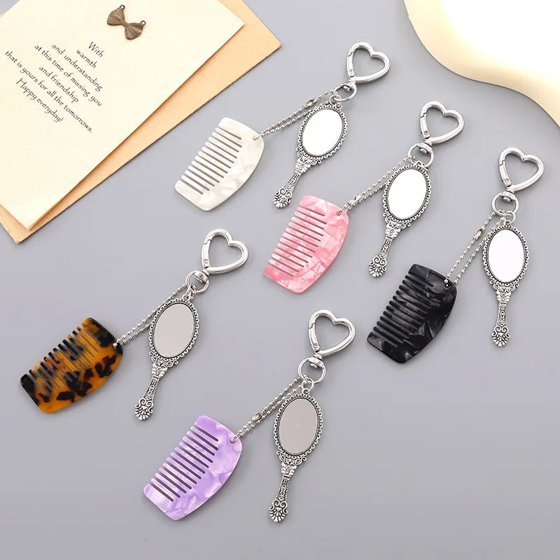 Zonyin Wholesale Mini Handle Handheld Makeup Mirror Keychain with Pendant Comb Mobile Phone Hanging Bag Decorative Accessories