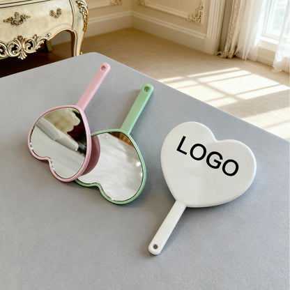 Wholesale Mini Heart Shaped Mirror HD Custom Logo Plastic Hand Held Makeup Mirror Cute Portable Cosmetic Pocket Mirror for Women