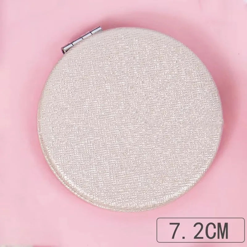 Zonyin Cute Portable Round PU Leather Folding Mirror Shiny Heart Shape 2X Double Sided Pu Pocket Makeup Mirror with Custom Logo