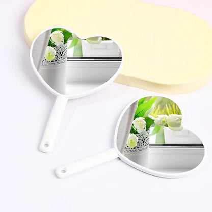 Wholesale Mini Heart Shaped Mirror HD Custom Logo Plastic Hand Held Makeup Mirror Cute Portable Cosmetic Pocket Mirror for Women