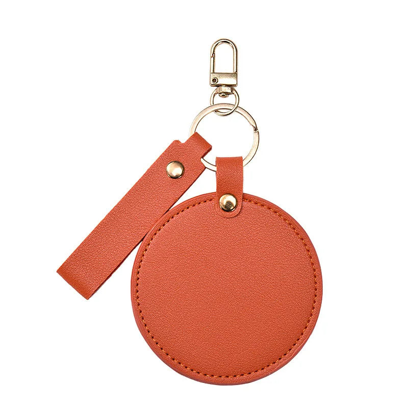 Zonyin LOW MOQ Customized Logo Round Pocket Cosmetic Mirror Pu Leather Portable Small Compact Makeup Mirror with Keychain